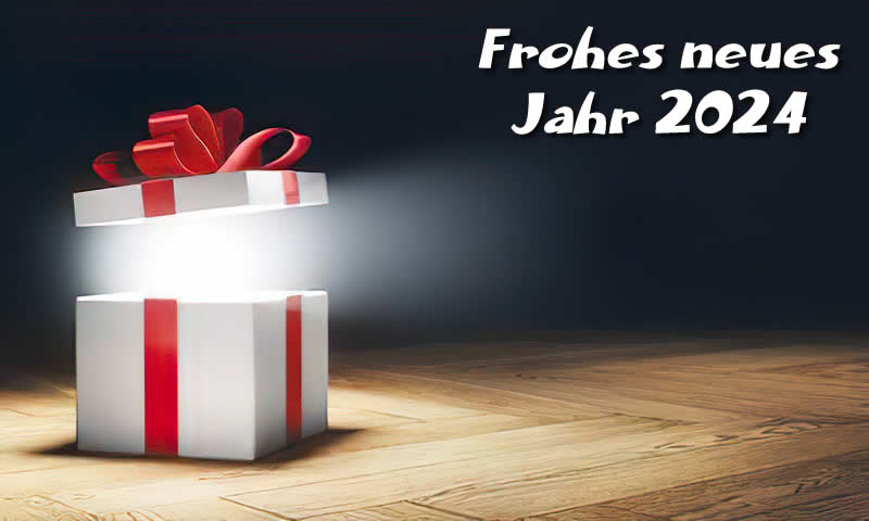 Grußkarte mit dem Bild eines Geschenkpakets, das mit viel Licht und einer Botschaft von schönen Feiertagen geöffnet wird